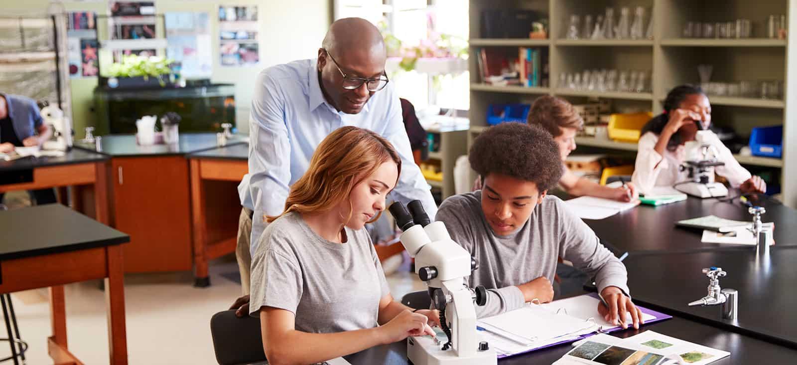 Student preforming lab experiment.